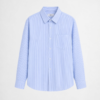 Light blue cotton-linen blend shirt with oversized fit and breathable minimalist styling by DAHAR.