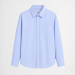 Light blue cotton-linen blend shirt with oversized fit and breathable minimalist styling by DAHAR.