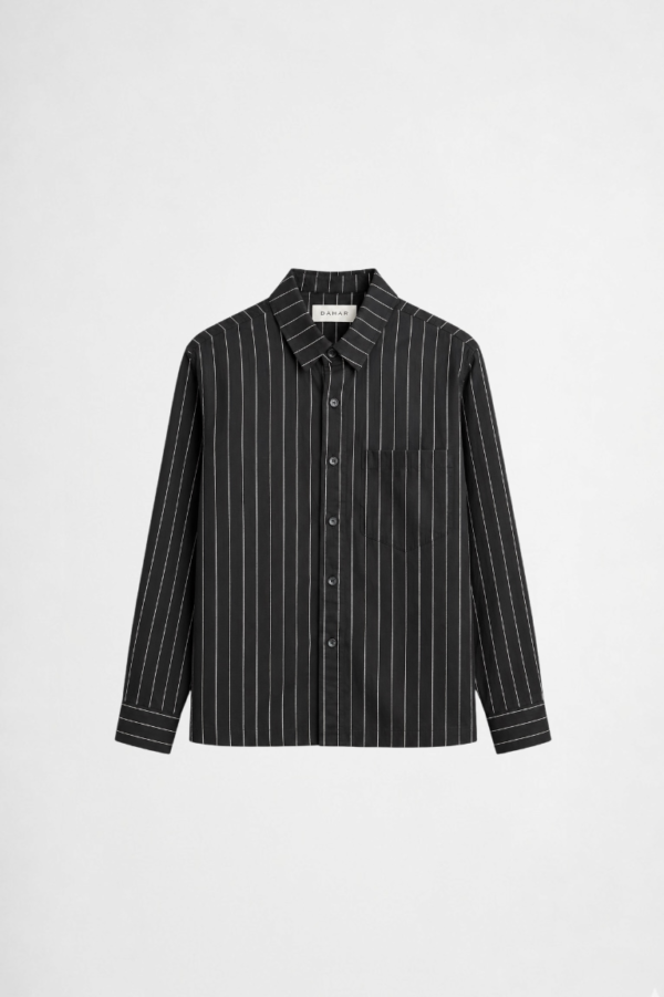 Black vertical stripe overshirt with oversized fit and modern layered streetwear styling by DAHAR.