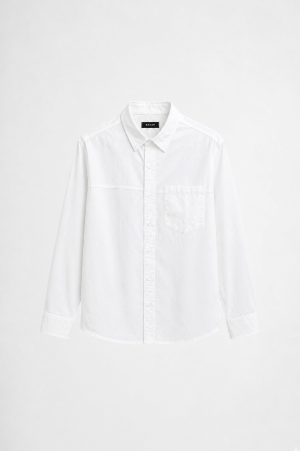 White cotton poplin long sleeve shirt with clean structured silhouette and minimalist styling by DAHAR.